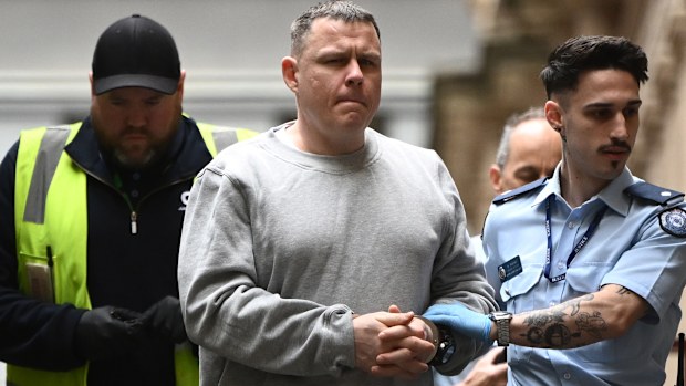 Luke James Picking (centre) arrives at the Melbourne Supreme Court in Melbourne, Wednesday, September 24, 2025.