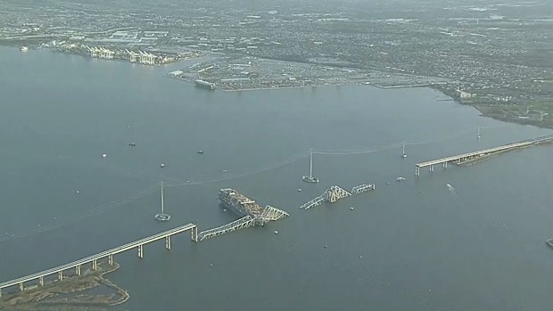 Parts of the Francis Scott Key Bridge remain after a container ship collided with one of the bridges support Tuesday, March 26, 2024 in Baltimore 