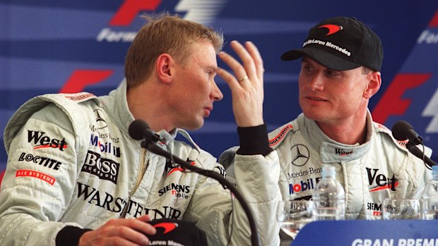 McLaren teammates Mika Hakkinen and David Coulthard in a press conference at the 2001 San Marino Grand Prix. (Photo by Andreas Rentz/Bongarts/Getty Images)