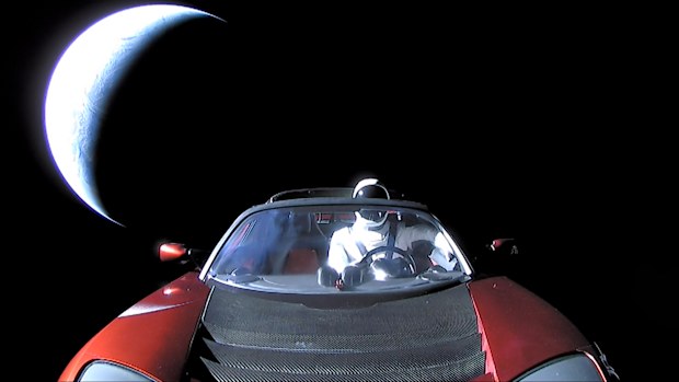 In this handout photo provided by SpaceX in February, a Tesla roadster launched from the Falcon Heavy rocket with a dummy driver named "Starman"  heads towards Mars. (Photo by SpaceX via Getty Images)
