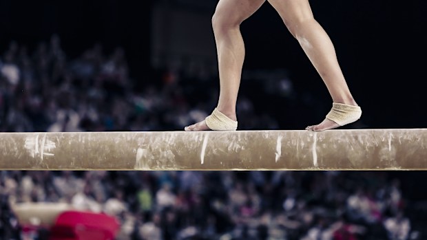 Basketball analyst Barry Booker is under fire for comments he made about gymnastics during the broadcast of a men's basketball game.