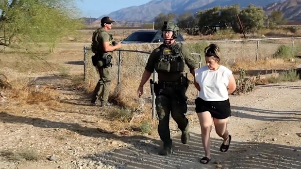 Rebecca Haro is seen being arrested at her home on August 22 in Cabazon, California