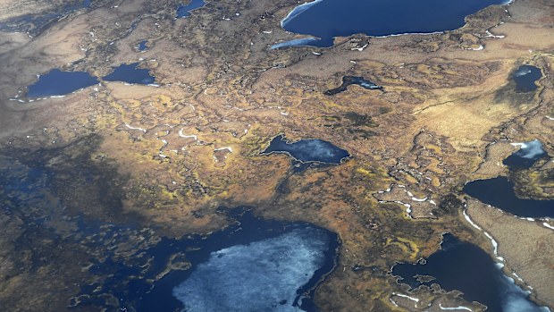 An aerial view shows melting permafrost tundra on the Yukon Delta in Alaska. The Arctic has been warming more than twice as fast as the rest of the planet, triggering a host of changes across the region.