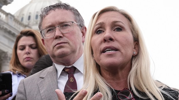Thomas Massie (left) and Marjorie Taylor Greene (right).