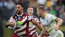 Bevan French of the Wigan Warriors runs the ball at Allegiant Stadium in Las Vegas.