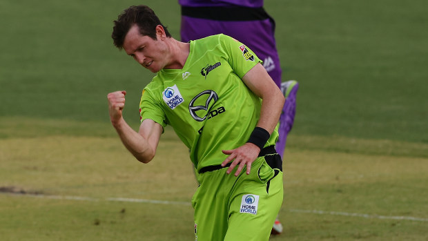 Adam Milne of the Thunder celebrates the wicket of Macalister Wright of the Hurricanes.