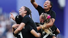Tyla King celebrates a gold medal with New Zealand's rugby sevens team in Paris.
