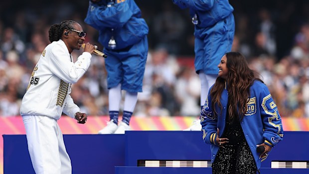 MELBOURNE, AUSTRALIA - SEPTEMBER 27: Snoop Dogg performs with Jessica Mauboy during the AFL Grand Final match between Geelong Cats and Brisbane Lions at Melbourne Cricket Ground on September 27, 2025 in Melbourne, Australia. (Photo by Cameron Spencer/AFL Photos/via Getty Images)