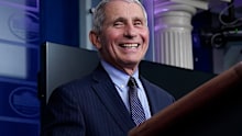 Dr Anthony Fauci, director of the National Institute of Allergy and Infectious Diseases, laughs while speaking in the James Brady Press Briefing Room at the White House.