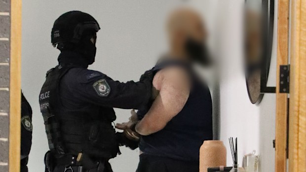 Two men, a staff member and a contractor, have been arrested for allegedly stealing almost $1.4 million intended for schools in Sydney. 