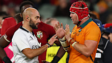 Andrea Piardi talks to Wallabies captain Harry Wilson. 