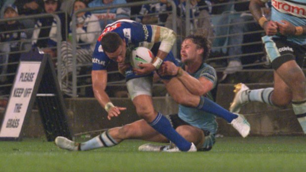 Marcelo Montoya is tackled by Nicho Hynes.