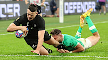 Will Jordan scores his team's third try during the Rugby World Cup match between Ireland and New Zealand at Stade de France.