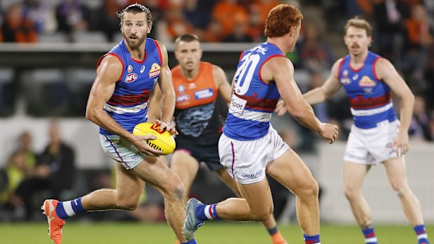 Marcus Bontempelli of the Bulldogs runs with the ball during the round seven AFL match between GWS Giants and Western Bulldogs at Manuka Oval, on April 26, 2025, in Canberra, Australia. (Photo by Darrian Traynor/Getty Images)