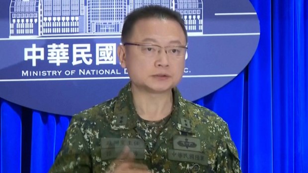 In this image taken off video, Sun Li-fang, Taiwan Defense Ministry spokesperson speaks about China's latest military drills during a press conference in Taipei, Taiwan on Monday, Dec. 29, 2025. (AP Photo/Wu Taijing)