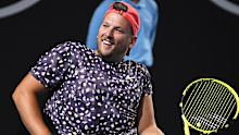 Dylan Alcott smiles during his quad wheelchair singles match.