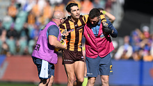 Hawthorn's Chad Wingard is helped from the field after suffering an Achilles injury in round 22.