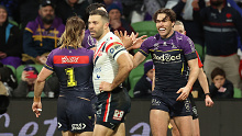 Grant Anderson of the Storm scores his second try against the Roosters.