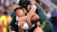 Keano Kini of New Zealand charges into the Kangaroos defence.