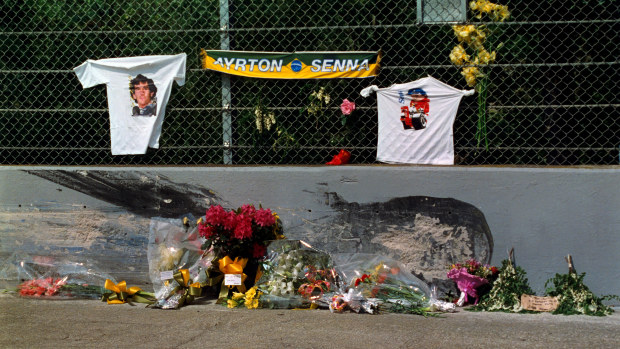 Memorials at the crash site following the death of Ayrton Senna.