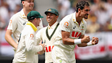 Australia's Mitchell Starc celebrates the wicket of Ben Stokes on day two of the first Ashes Test.