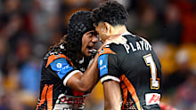 BRISBANE, AUSTRALIA - MAY 03: Jahream Bula of the Tigers celebrates after scoring a try with Jarome Luai of the Tigers during the round nine NRL match between Wests Tigers and St George Illawarra Dragons at Suncorp Stadium, on May 03, 2025, in Brisbane, Australia. (Photo by Hannah Peters/Getty Images)