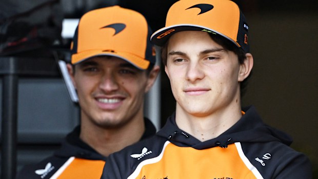 Lando Norris of Great Britain and McLaren and Oscar Piastri of Australia and McLaren look on in the Paddock during previews ahead of the F1 Grand Prix of China at Shanghai International Circuit on March 20, 2025 in Shanghai, China. (Photo by Mark Sutton - Formula 1/Formula 1 via Getty Images)