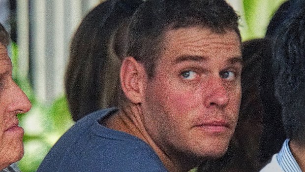 Matthew Norman, 38, was arrested at Waverley police station on Monday and charged with being a passenger in a stolen car on March 16, 2005.