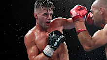 Issac Hardman punches Tej Pratap Singh during their middleweight fight at Fortitude Music Hall in 2020.