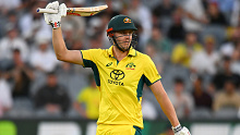 MELBOURNE, AUSTRALIA - FEBRUARY 02: Cameron Green of Australia celebrates scoring 50 runs during game one of the One Day International series between Australia and West Indies at Melbourne Cricket Ground on February 02, 2024 in Melbourne, Australia. (Photo by Morgan Hancock - CA/Cricket Australia via Getty Images)