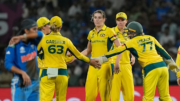 Australia's Annabel Sutherland, centre, celebrates the wicket of India's Richa Ghosh with her teammates during the ICC Women's Cricket World Cup cricket semi final match between India and Australia at DY Patil Stadium in Navi Mumbai, India, Thursday, Oct. 30, 2025.