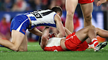 Jacob Konstanty of the Kangaroos and Tom Papley of the Swans wrestle during the 2026 AFL Round 09 match between the North Melbourne Kangaroos and the Sydney Swans at Marvel Stadium on May 9, 2026 in Melbourne, Australia. (Photo by James Wiltshire/AFL Photos via Getty Images)