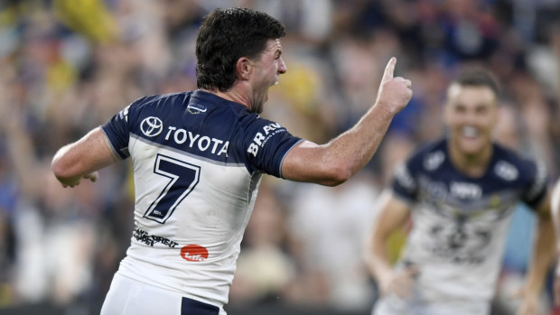 Chad Townsend celebrates kicking the winning fieldgoal for the North Queensland Cowboys over the Newcastle Knights.