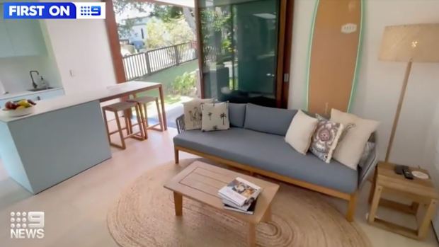 The home features a kitchen, bedroom, bathroom and ample entertainment space.
