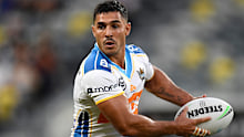 Jamal Fogarty runs the ball in the Titans' final against the Roosters.