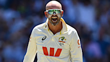 Nathan Lyon celebrates dismissing Ben Duckett. 