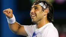 MELBOURNE, AUSTRALIA - JANUARY 20:  Marcos Baghdatis of Cyprus smiles after a point during his match against Lleyton Hewitt of Australia in the third round on day six of the Australian Open 2008 at Melbourne Park in the early morning hours of January 20, 2008 in Melbourne, Australia.  (Photo by Ezra Shaw/Getty Images)