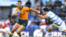 Quade Cooper of the Wallabies charges forward during The Rugby Championship match.