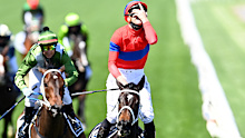 MELBOURNE, AUSTRALIA - NOVEMBER 02: James Mcdonald riding #4 Verry Elleegant wins race 7, the Lexus Melbourne Cup during 2021 Melbourne Cup Day at Flemington Racecourse on November 02, 2021 in Melbourne, Australia. (Photo by Quinn Rooney/Getty Images)