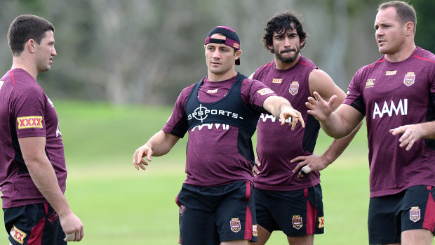 Cooper Cronk and Johnathan Thurston direct a 2014 Origin training session.