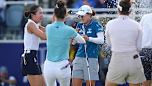 Fellow players flood Minjee Lee on the 18th green after she won the women's PGA Championship.