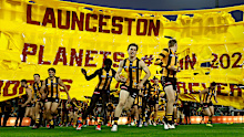 The Hawks run out in Tassie.
