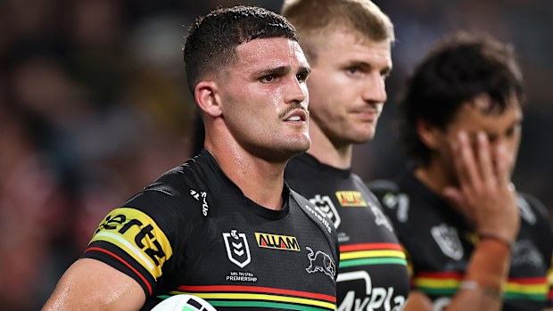 Nathan Cleary of the Panthers and team mates look on after loss. 