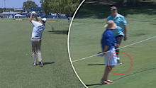 Marc Leishman's shot collides with a spectator