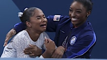 Jordan Chiles and Simone Biles celebrate as they see the scores and win bronze and silver medals in the floor routine on Aug. 5, 2024, at Bercy Arena during the Paris Olympics. (Brian Cassella/Chicago Tribune)