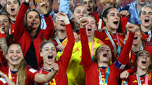 Spain's Queen Letizia and Infanta Sofia celebrate with the trophy and players after Spain wins the world cup  Sunday August 20, 2023
