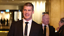 Jonathan Brown and Chris Judd are seen at the Australian Football Hall of Fame in 2025.