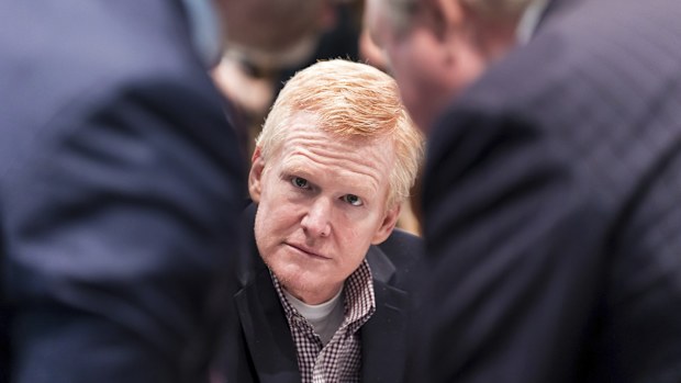 Alex Murdaugh listens as his defense attorneys Phillip Barber, left, and Dick Harpootlian confer during his trial at the Colleton County Courthouse in Walterboro, S.C., on Tuesday, Feb. 21, 2023.  