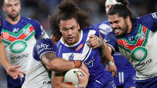 Raymond Faitala-Mariner of the Bulldogs is tackled during the round 11 NRL match between Canterbury Bulldogs and New Zealand Warriors at Accor Stadium on May 12, 2023 in Sydney, Australia. (Photo by Brendon Thorne/Getty Images)