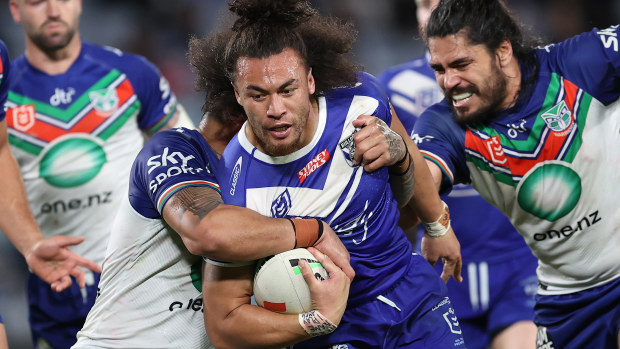 Raymond Faitala-Mariner of the Bulldogs is tackled during the round 11 NRL match between Canterbury Bulldogs and New Zealand Warriors at Accor Stadium on May 12, 2023 in Sydney, Australia. (Photo by Brendon Thorne/Getty Images)